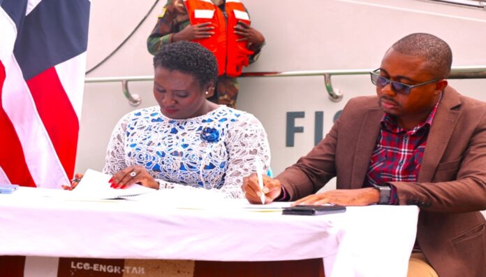 Hon. Glassco and Hon Kamara Signing MoU on Cooperation and Coordination to support Fisheries operations before the Lone Star Fisheries Patrol Vessel
